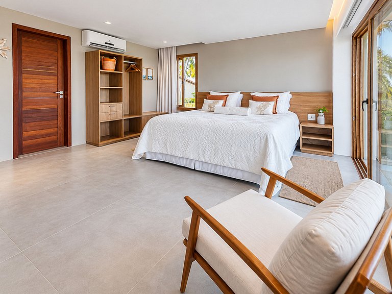 Villa junto a la playa con piscina climatizada en Mamucabinh